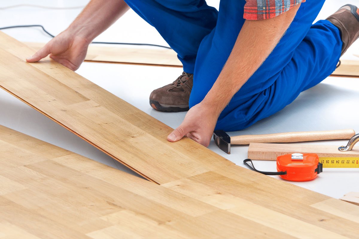 Laminate flooring installation by experts at Carpet & Flooring Warehouse for a stylish and durable home transformation